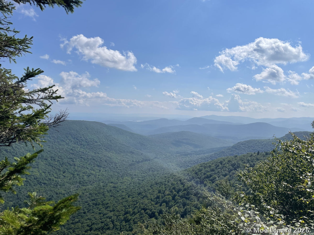 View from Sugarloaf Mountain over forested Catskill ridges